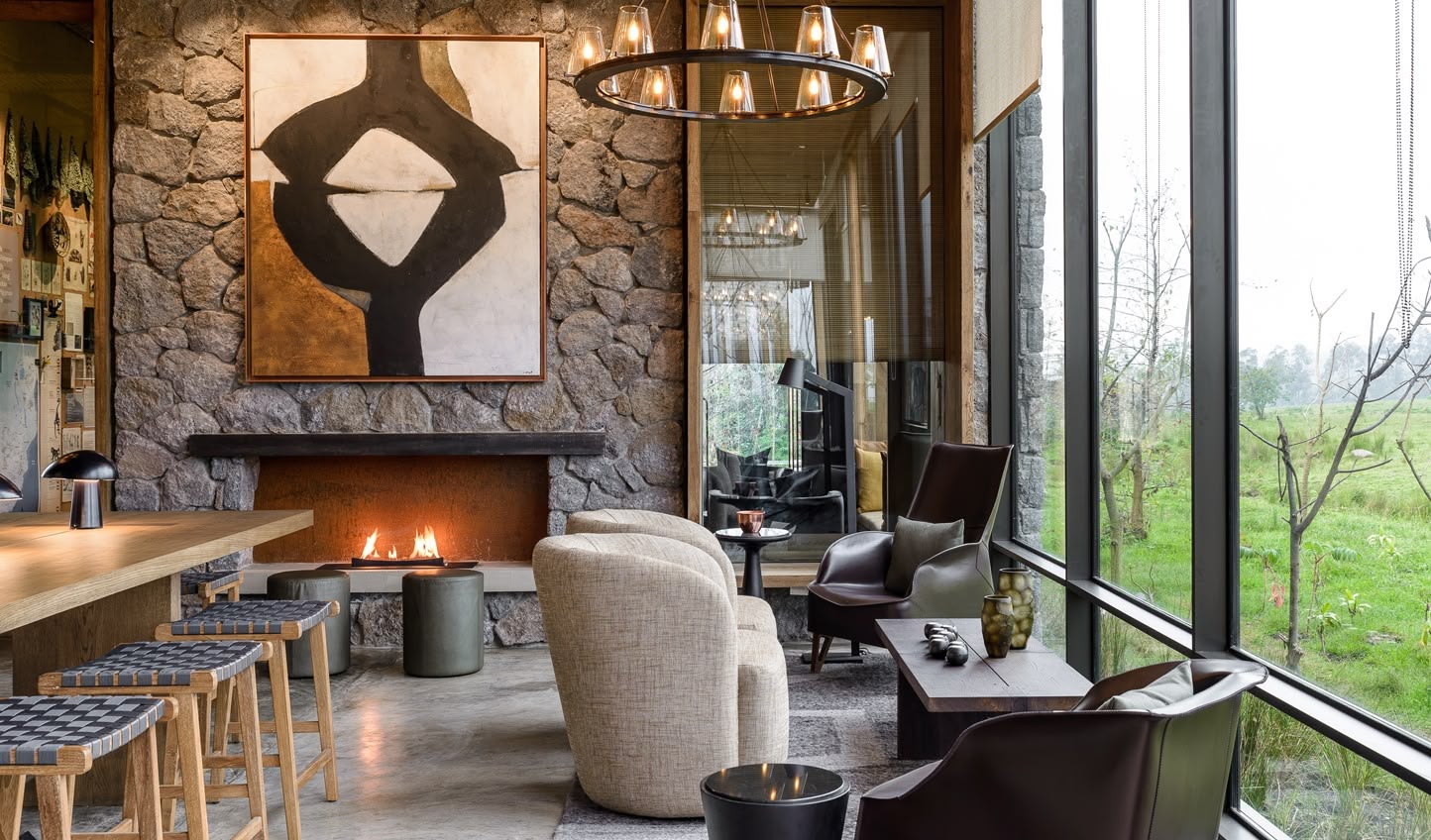 Singita_Kwitonda lodge_ luxury_-Lounge_fireplace_
